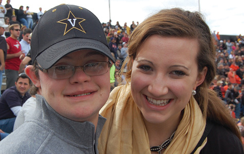 Next Steps at Vanderbilt student with Down syndrome at a football game with a Vanderbilt Ambassadore