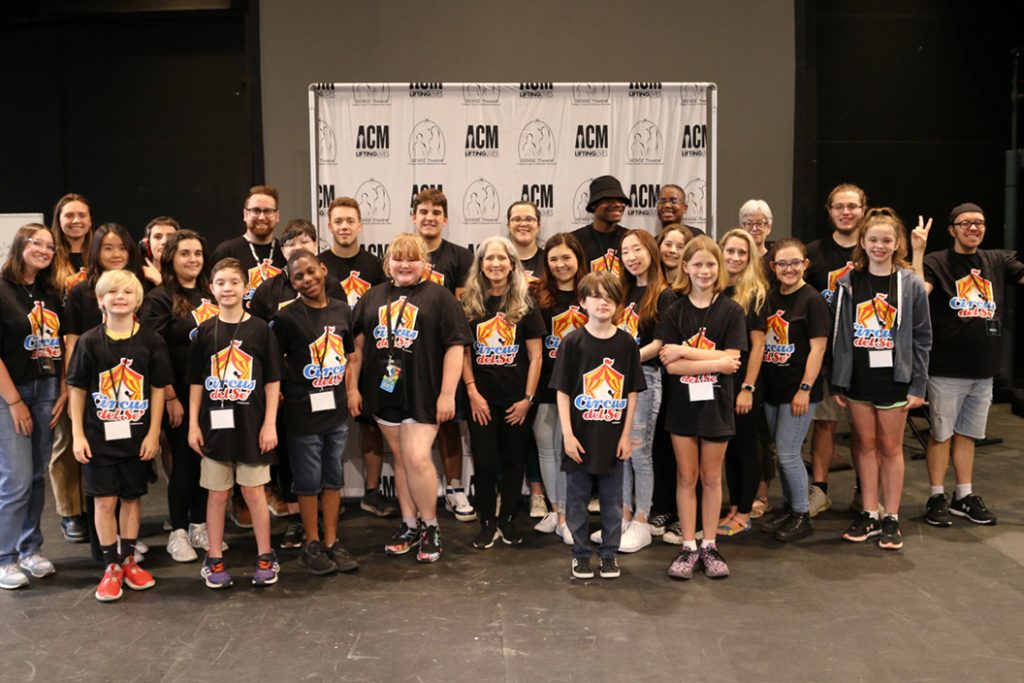 Group of campers standing and smiling together
