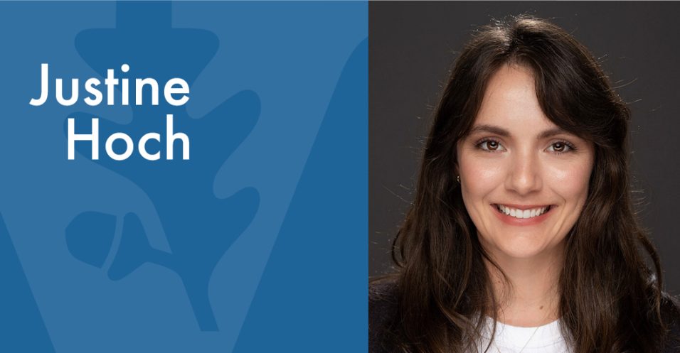 Graphic layout with a portrait photo on the right and a blue panel on the left displaying large white text that reads ‘Justine Hoch.’