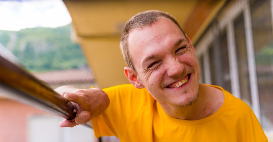 Adult with a developmental disability smiling